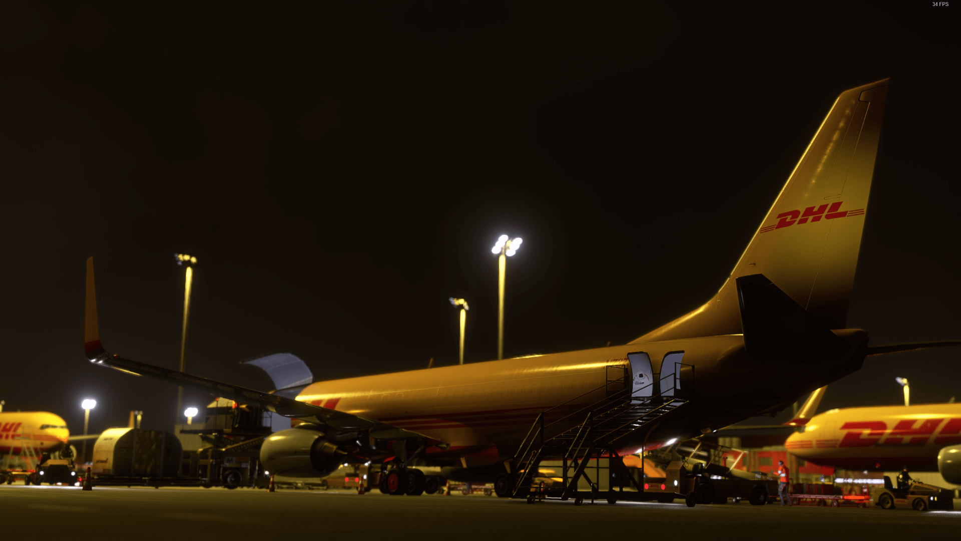 Cargo freighter aircraft on the ramp at night under floodlights, in-simulator render